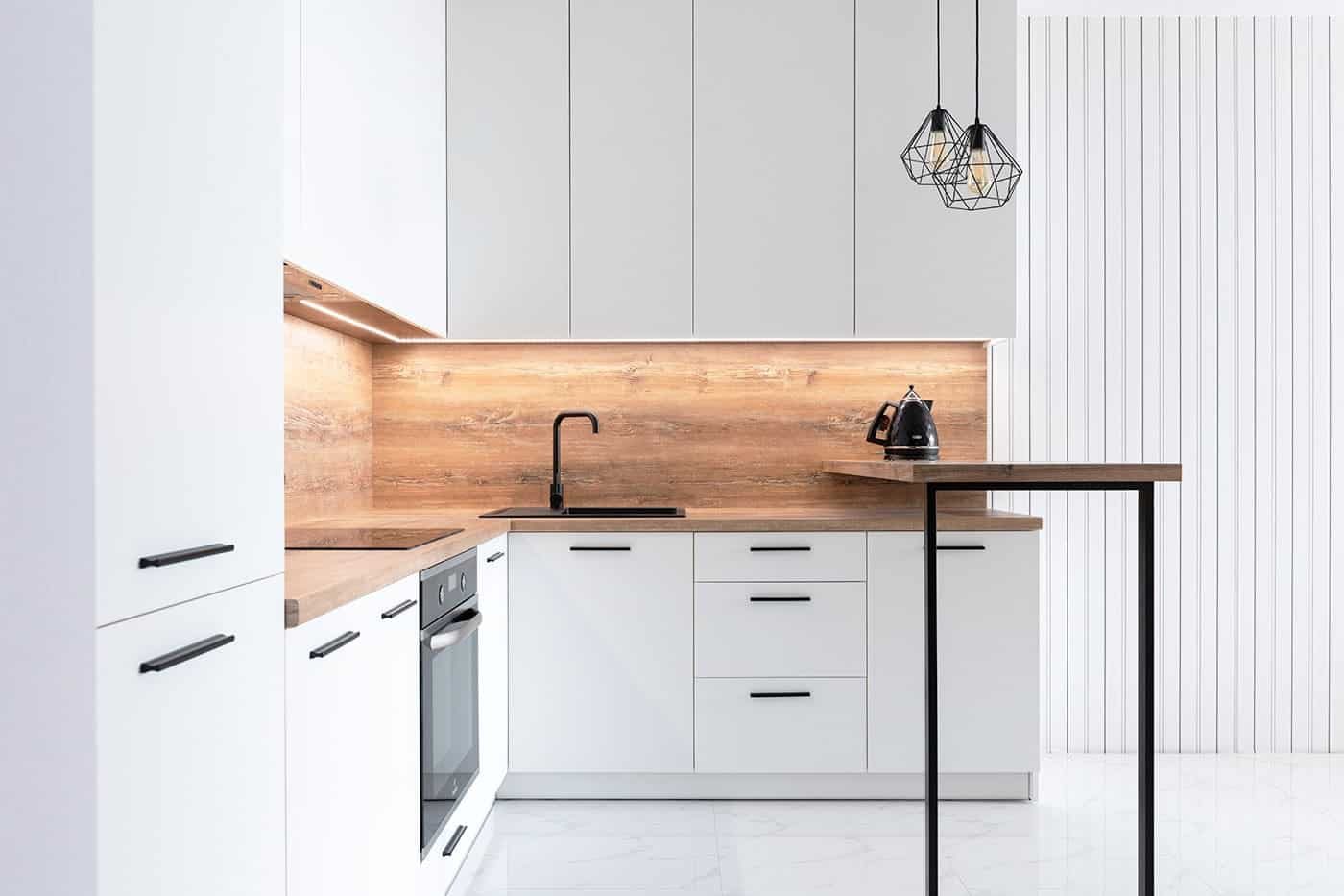 A modern kitchen with wooden worktops